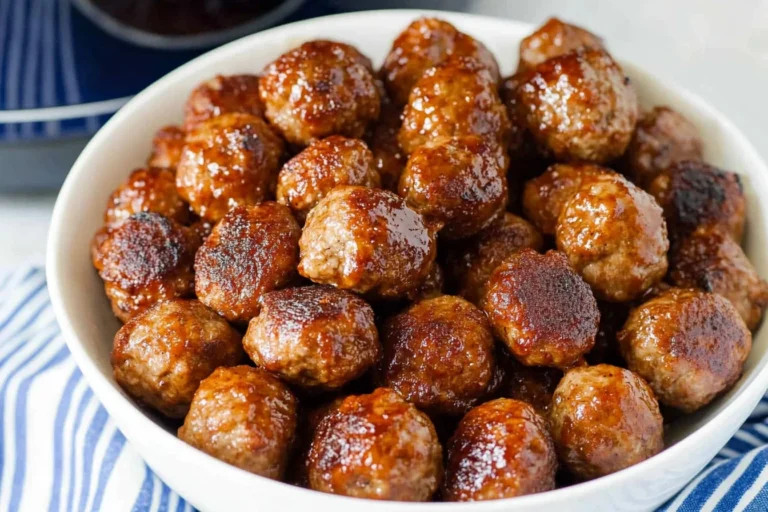 Plate of grape jelly meatballs in a savory sauce